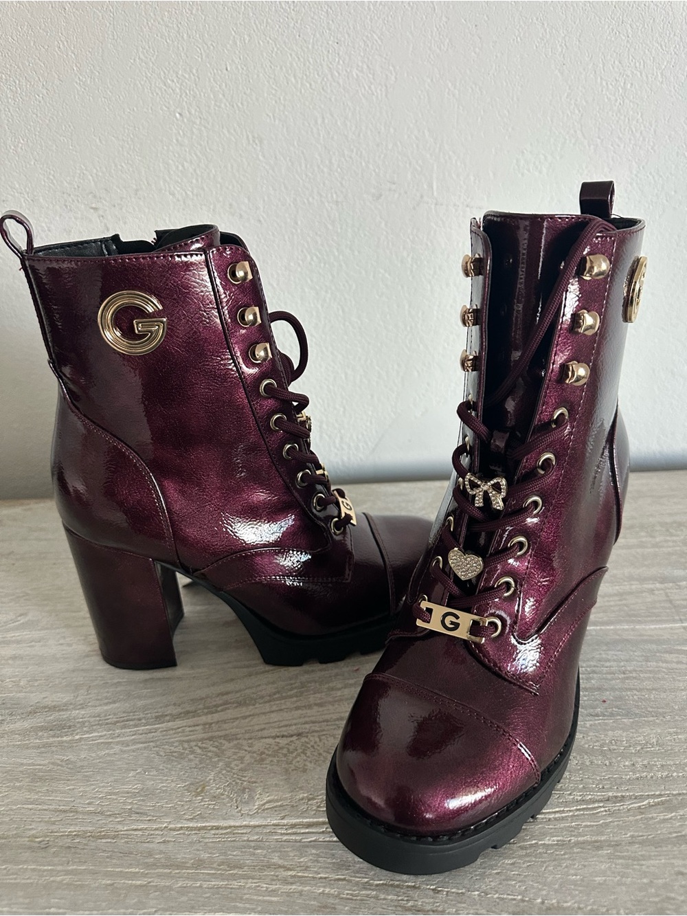 Los Angeles
GBG Los Angeles burgundy Lace-Up Combat Boots with Gold Accents